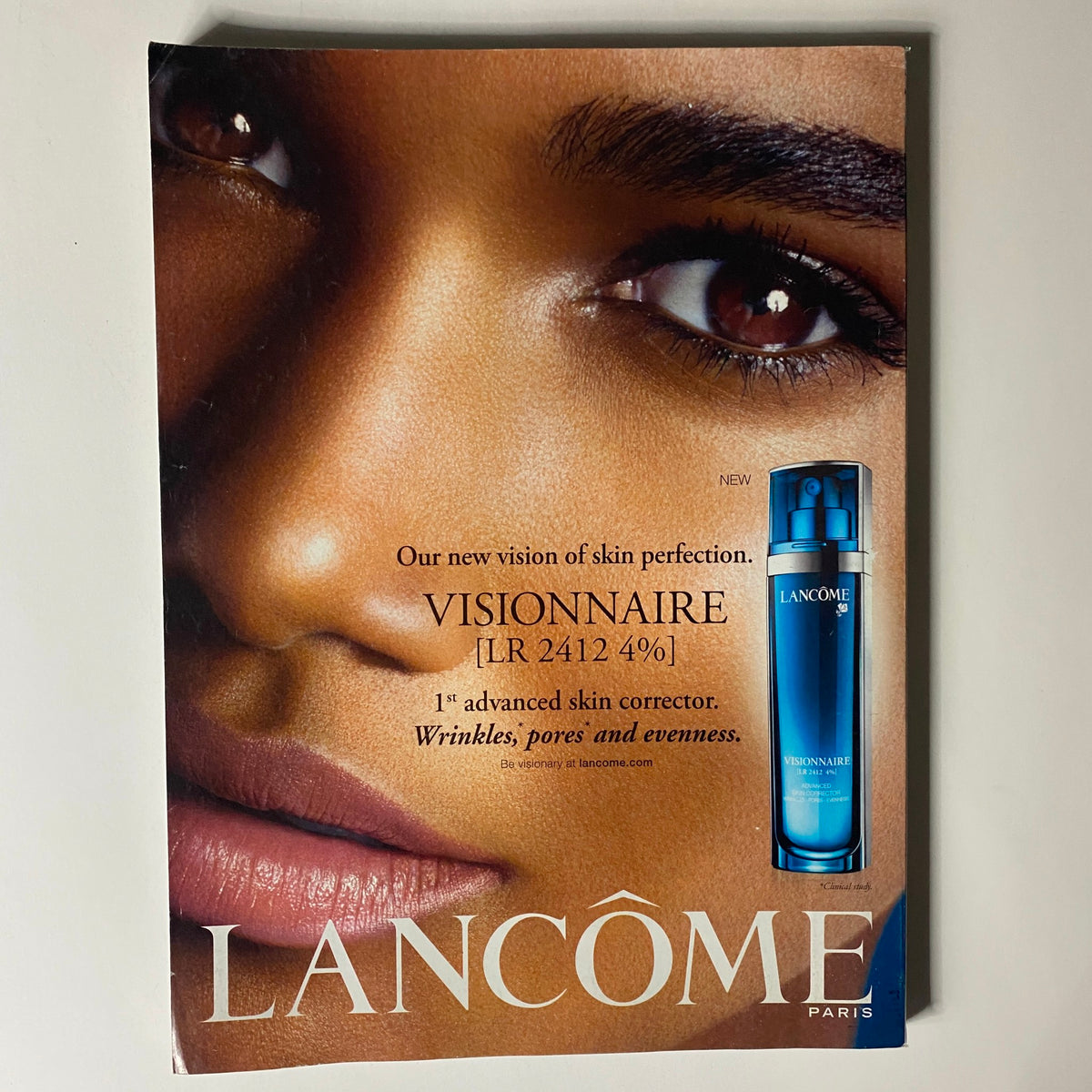 Lancôme skin perfection advertisement showcasing Visionnaire product in Vogue Magazine November 2011 featuring Rooney Mara on the cover.