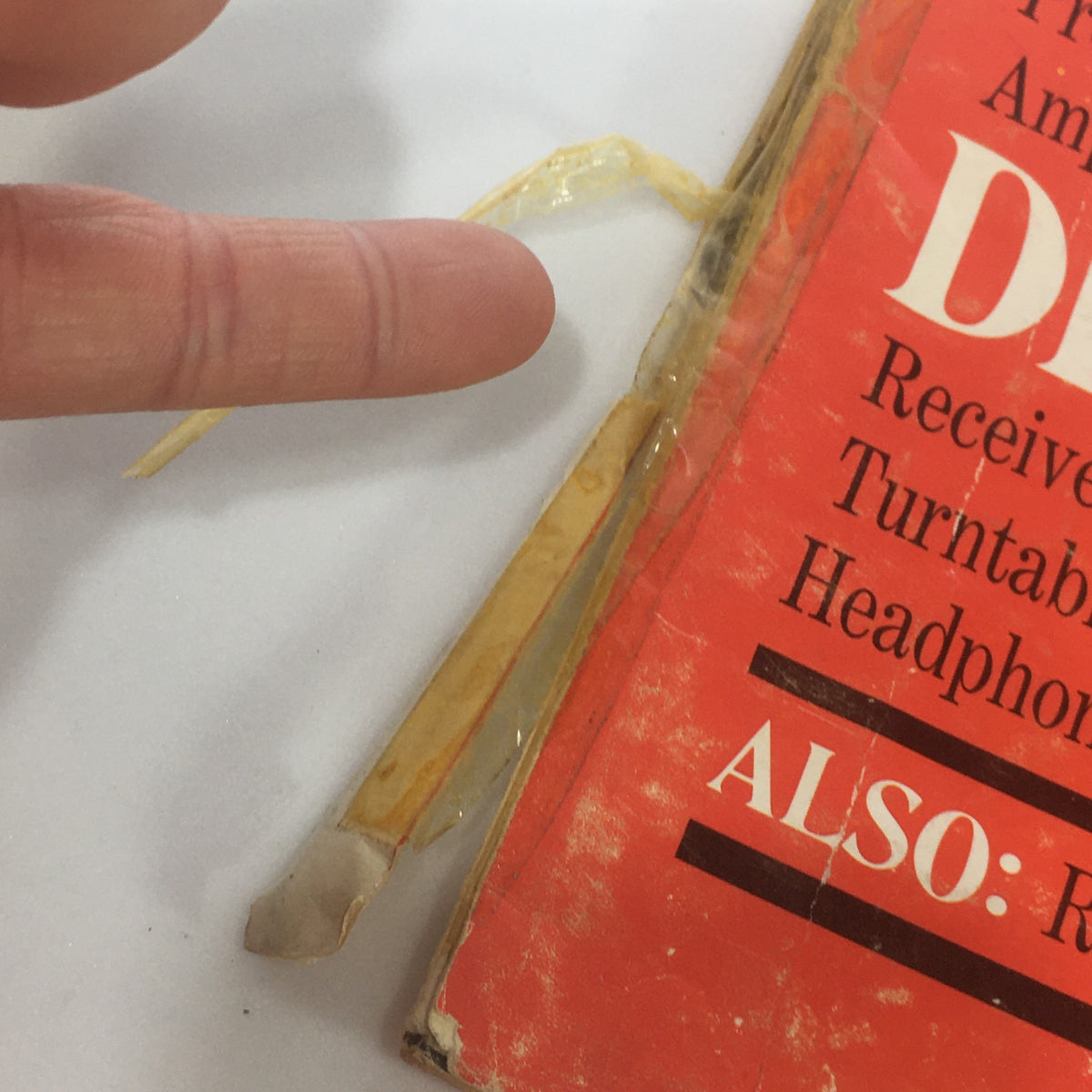 Close-up view of the spine of the Vintage Audio & Music Magazine September 1969, showing signs of wear and intact protective covering.