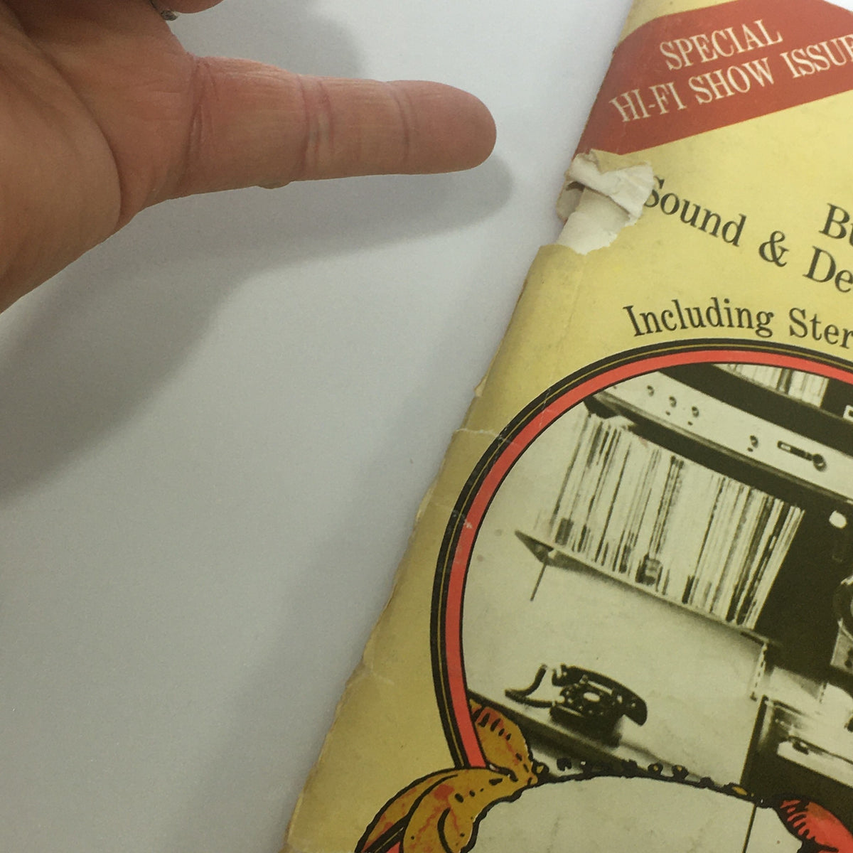 Side view of Vintage Audio & Music Magazine October-November 1968, showcasing the spine and damaged corner of the cover.