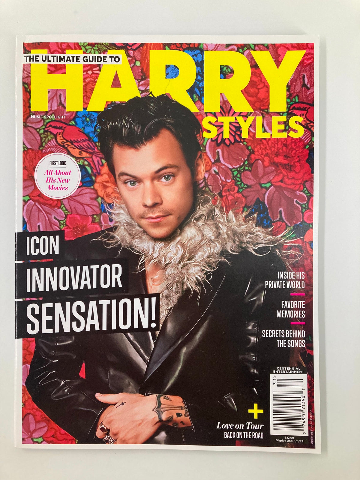 Cover of Music Spotlight Magazine April 2021 featuring the Ultimate Guide to Harry Styles showcasing a stylish portrait of him with the caption 'Icon Innovator Sensation!' and vibrant floral background.