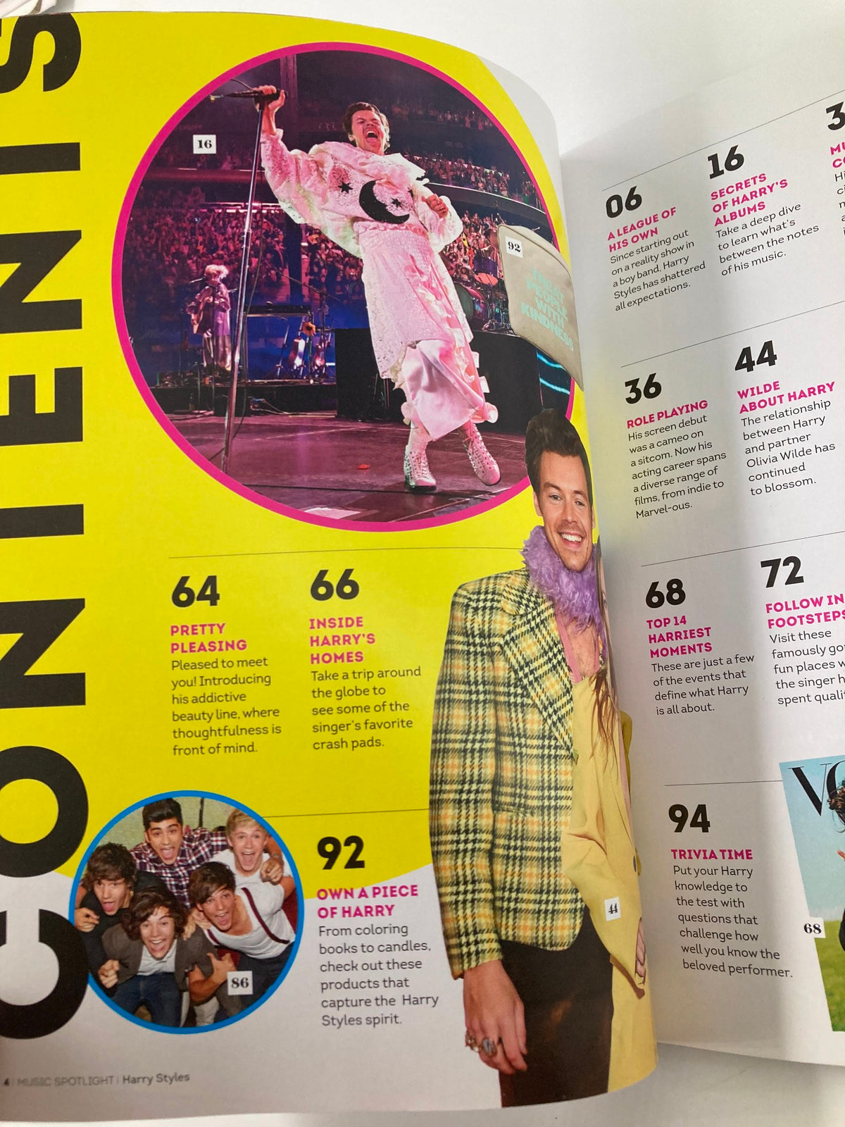 Music Spotlight Magazine July 2022 Ultimate Guide to Harry Styles featuring images of Harry Styles performing on stage and interacting with fellow artists, showcasing the vibrant energy of his musical career.