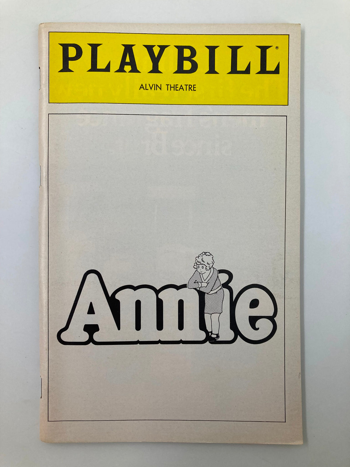 1980 Playbill for 'Annie' at the Alvin Theatre, featuring a minimalist cover design with the title 'Annie' and an illustration of the character.