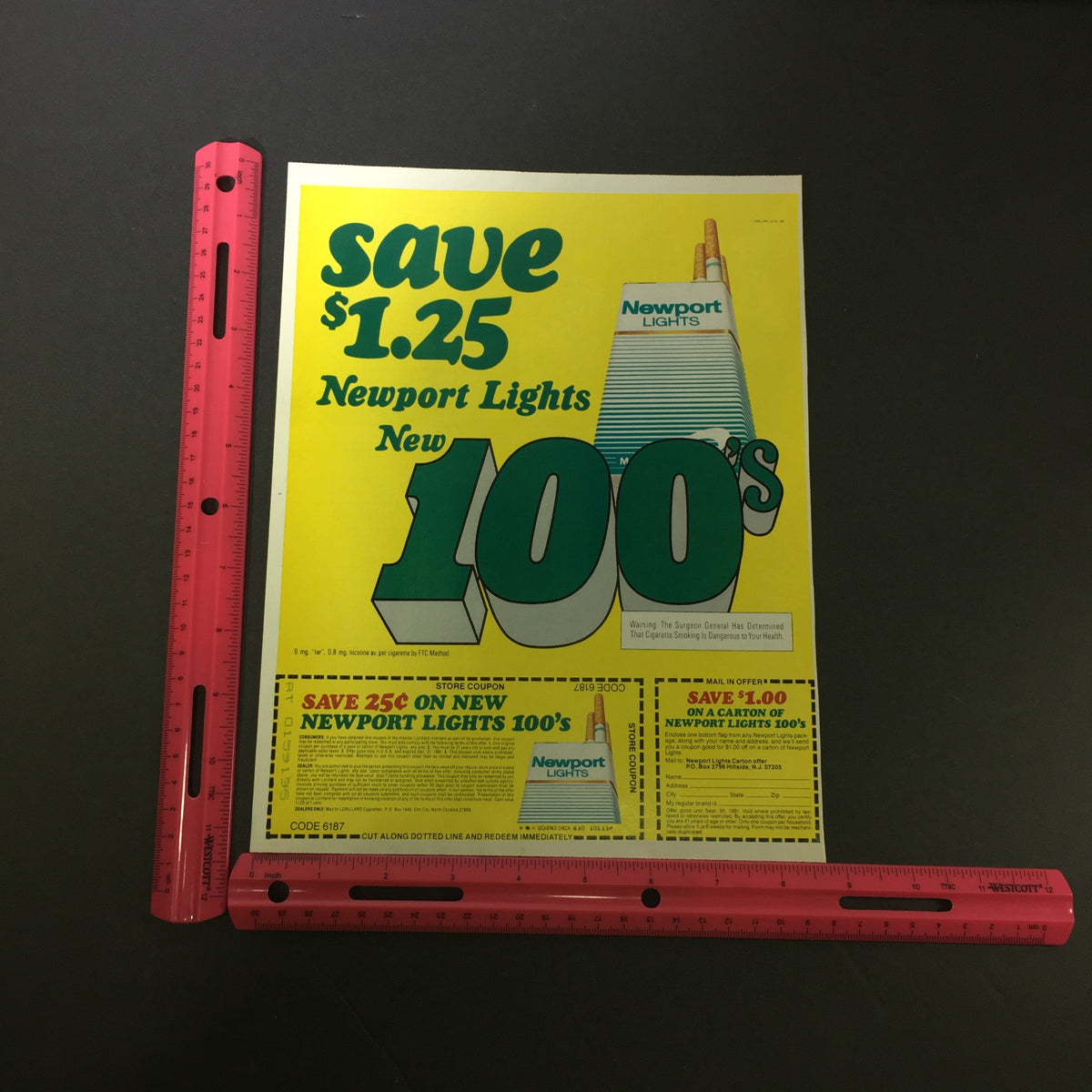 VTG 1980 Newport Lights New 100's Menthol & Regular Cigarettes Print Ad highlighting a coupon to save $1.25 on Newport Lights 100s with clear measurement indication using a pink ruler.