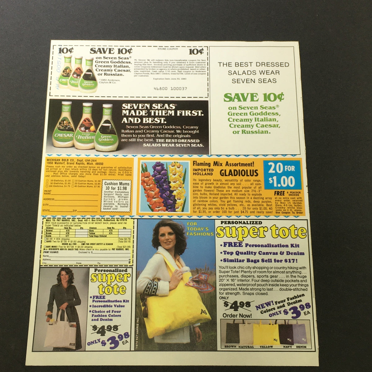 Vintage print ad featuring a coupon for Seven Seas salad dressings, promoting Green Goddess, Creamy Italian, and other flavors. The ad showcases a vibrant layout and various products including a personalized super tote.