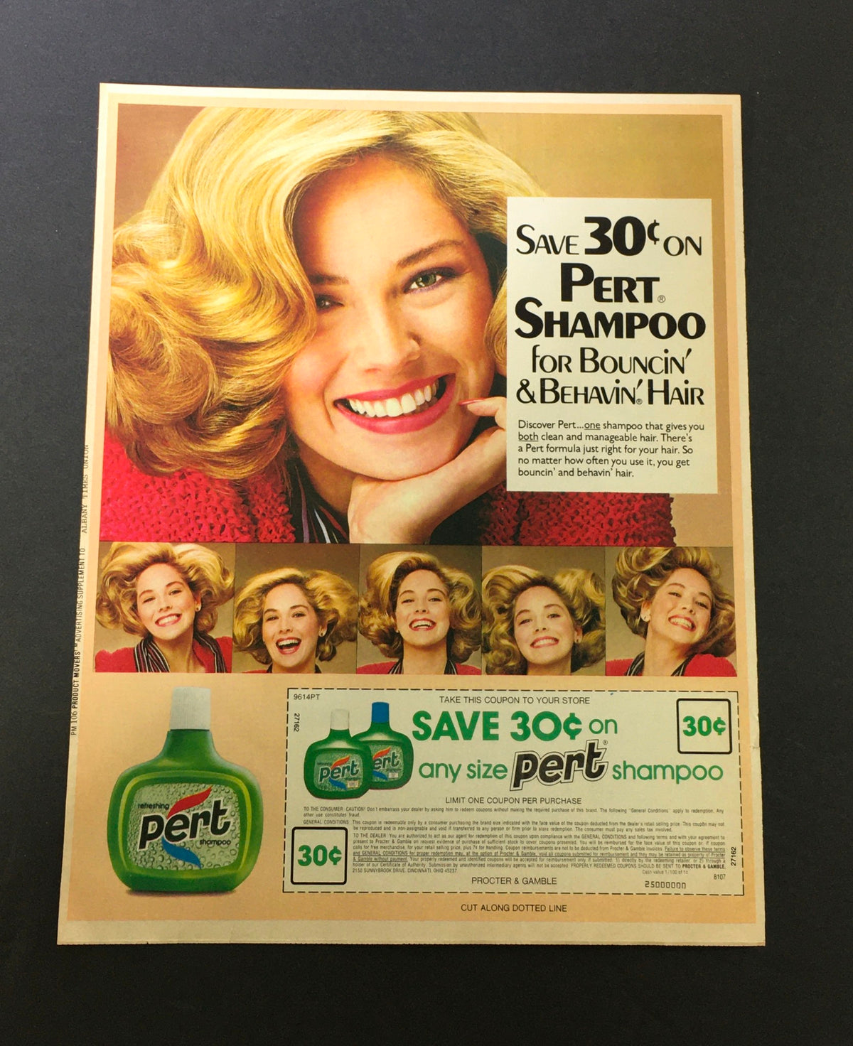 VTG 1980 Pert Refreshing Shampoo For Bouncin' & Behavin' Hair Print Ad featuring a woman smiling with stylish hair, showcasing a coupon for $0.30 off Pert shampoo.