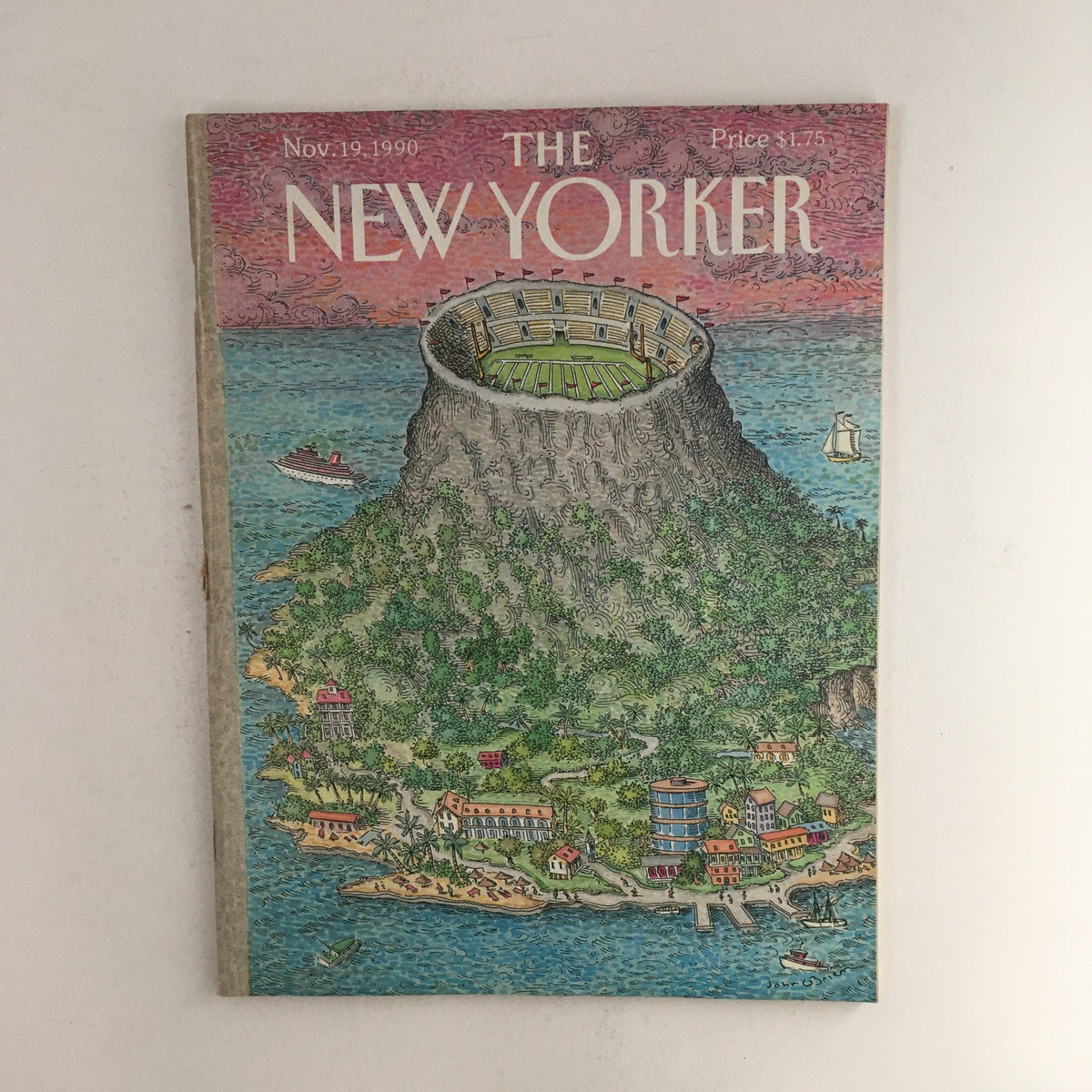 The New Yorker November 19, 1990 full magazine cover featuring an illustration by John O'Brien depicting a volcanic island with a stadium surrounded by ocean and lush scenery.