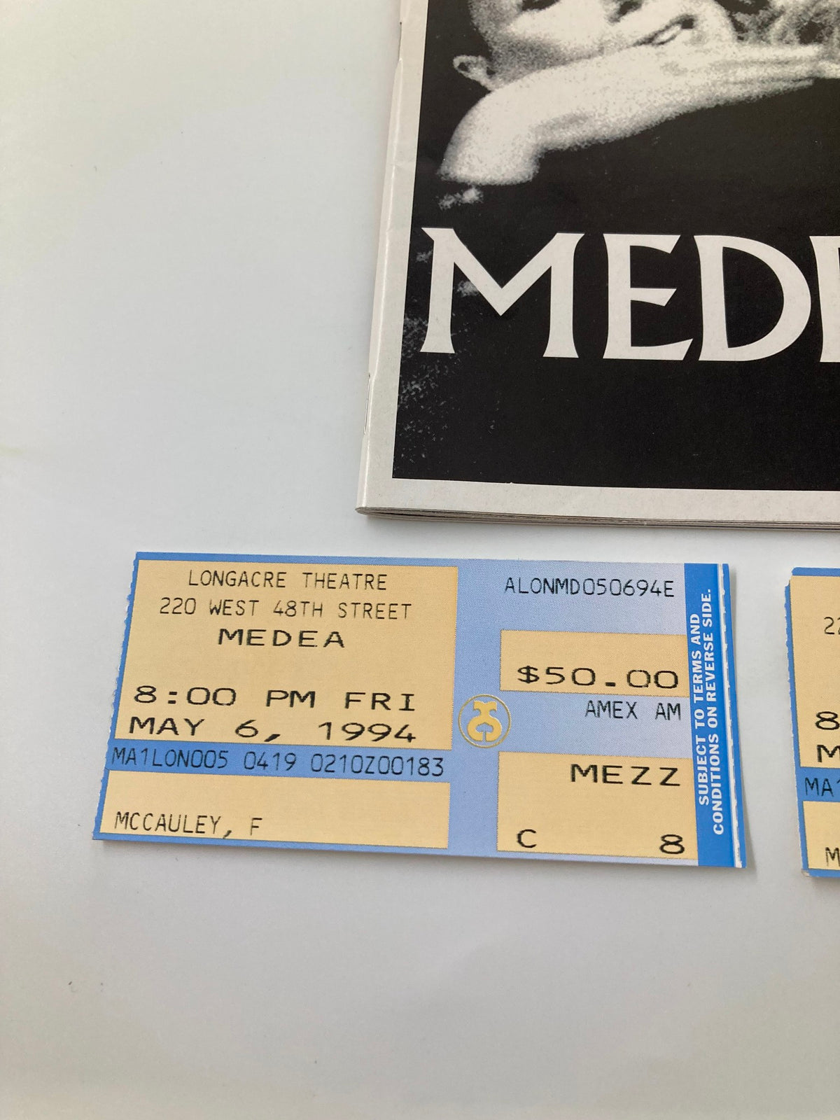 Close-up of the 1994 Playbill for Longacre Theatre's Medea, displaying performance tickets dated May 6, 1994 and pricing details.