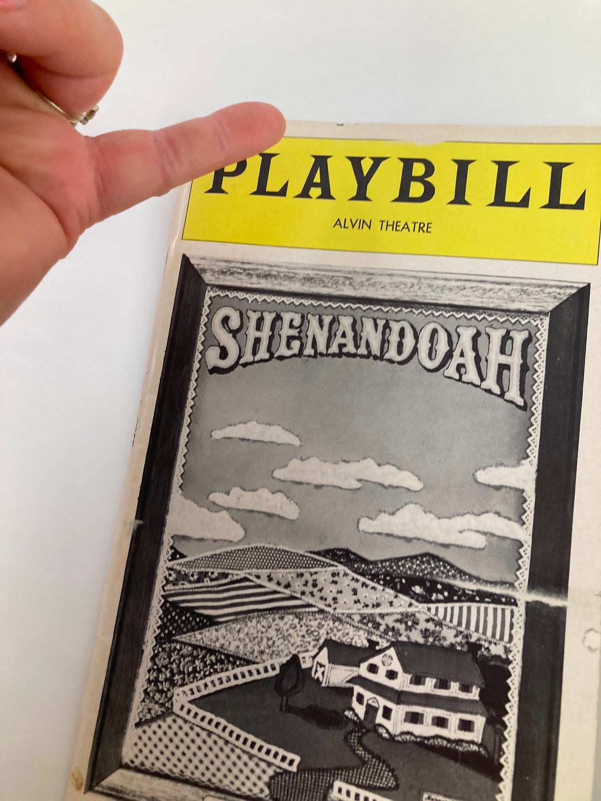 1976 Playbill for Shenandoah at Alvin Theatre, featuring the title prominently displayed with an artistic illustration in the background.