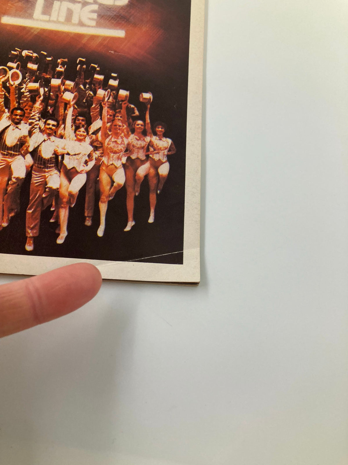 1983 Playbill for A Chorus Line at Sam S. Shubert Theatre showing performers in costumes, highlighting the vibrant energy of the iconic musical.