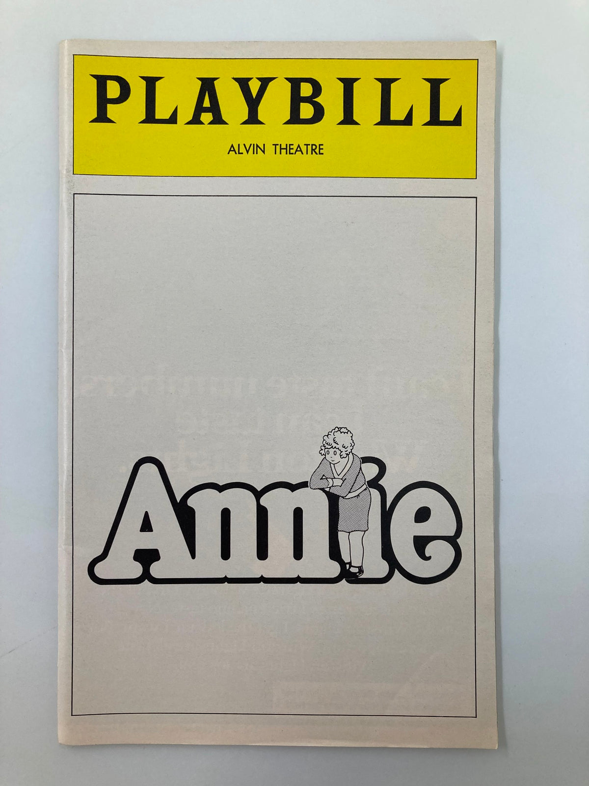 1977 Playbill of Annie A Musical at Alvin Theatre featuring character logo and title.