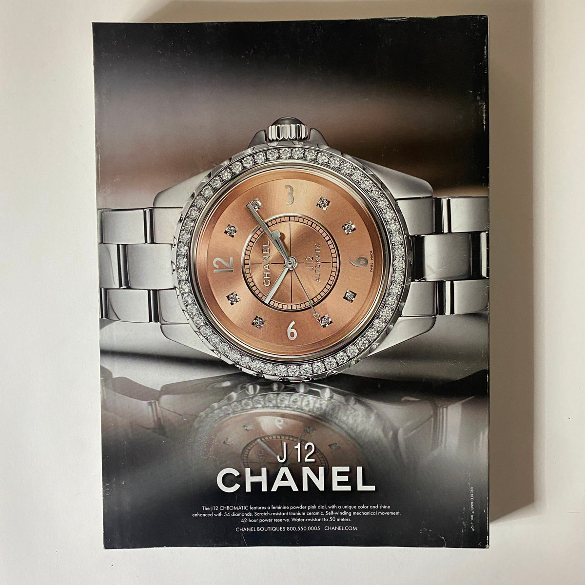 Vogue Magazine March 2013 Beyonce Power Issue - An elegant advertisement featuring a Chanel J12 watch, highlighting luxury and timeless fashion design.