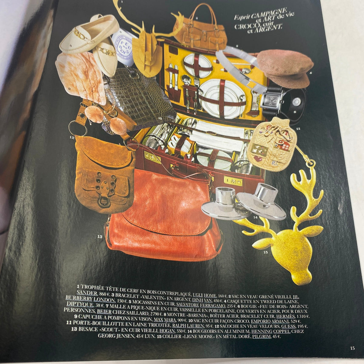 Page from Vogue Paris Supplement December 2005 showcasing luxury gift items, including bags and accessories, arranged aesthetically.