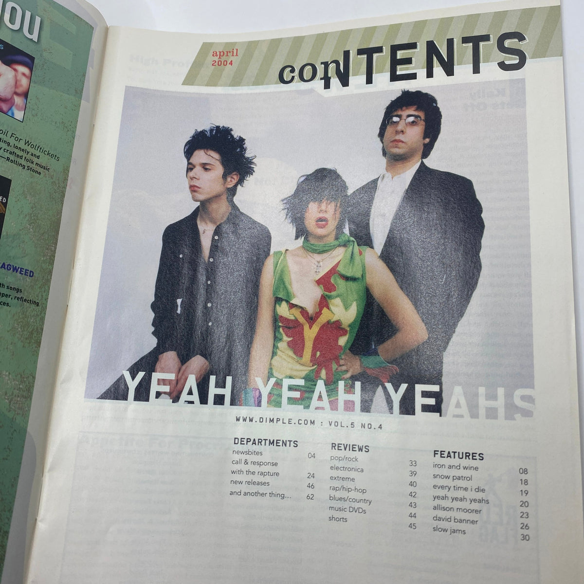 Contents page of Earwax Magazine April 2004 Vol 5 No. 4, highlighting the Yeah Yeah Yeahs with a photo and listing magazine departments and features.