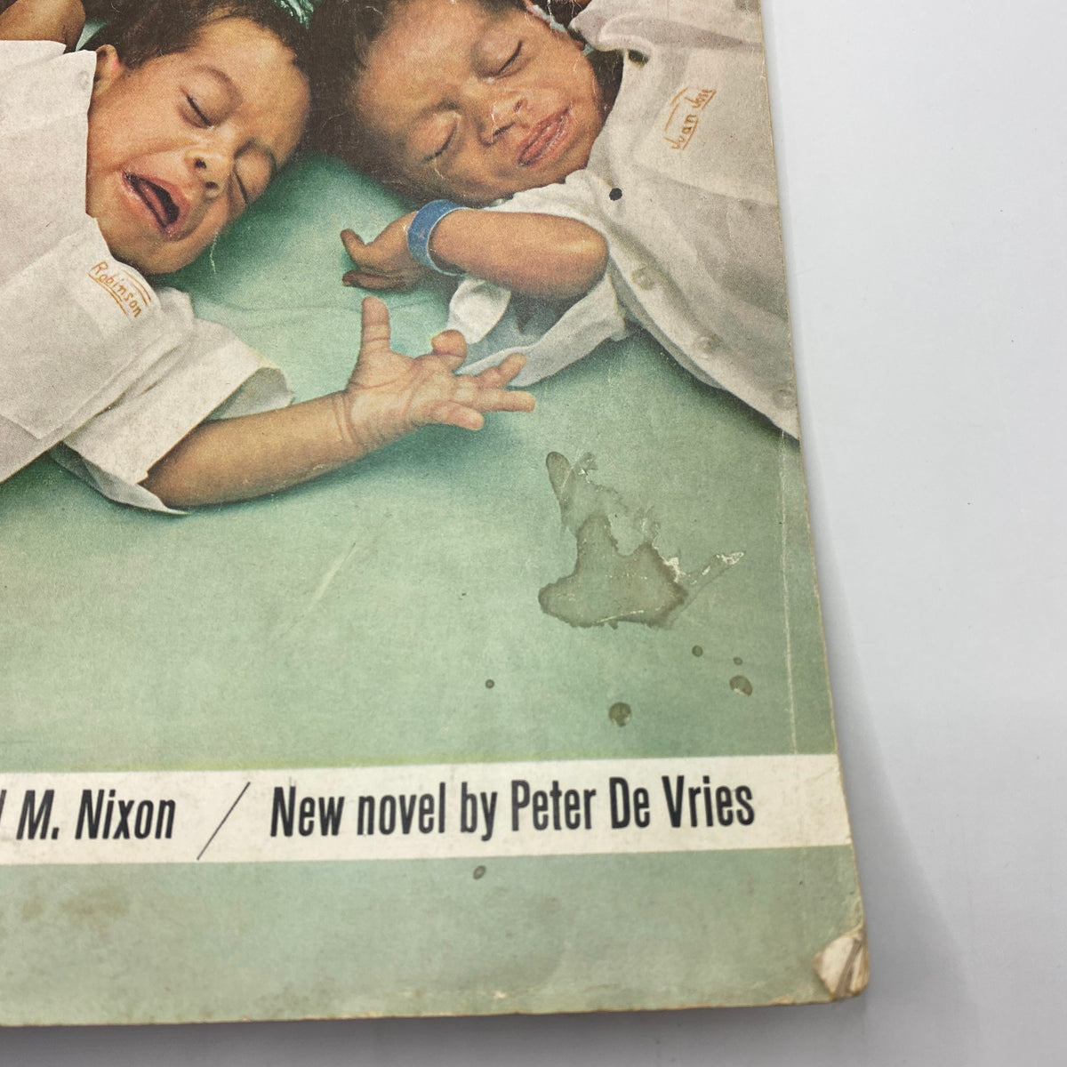 Close-up of the cover of The Saturday Evening Post magazine, January 18, 1964, showcasing two infants from the article 'The Other Quints.' The image captures the emotional expressions and unique charm of vintage print media.