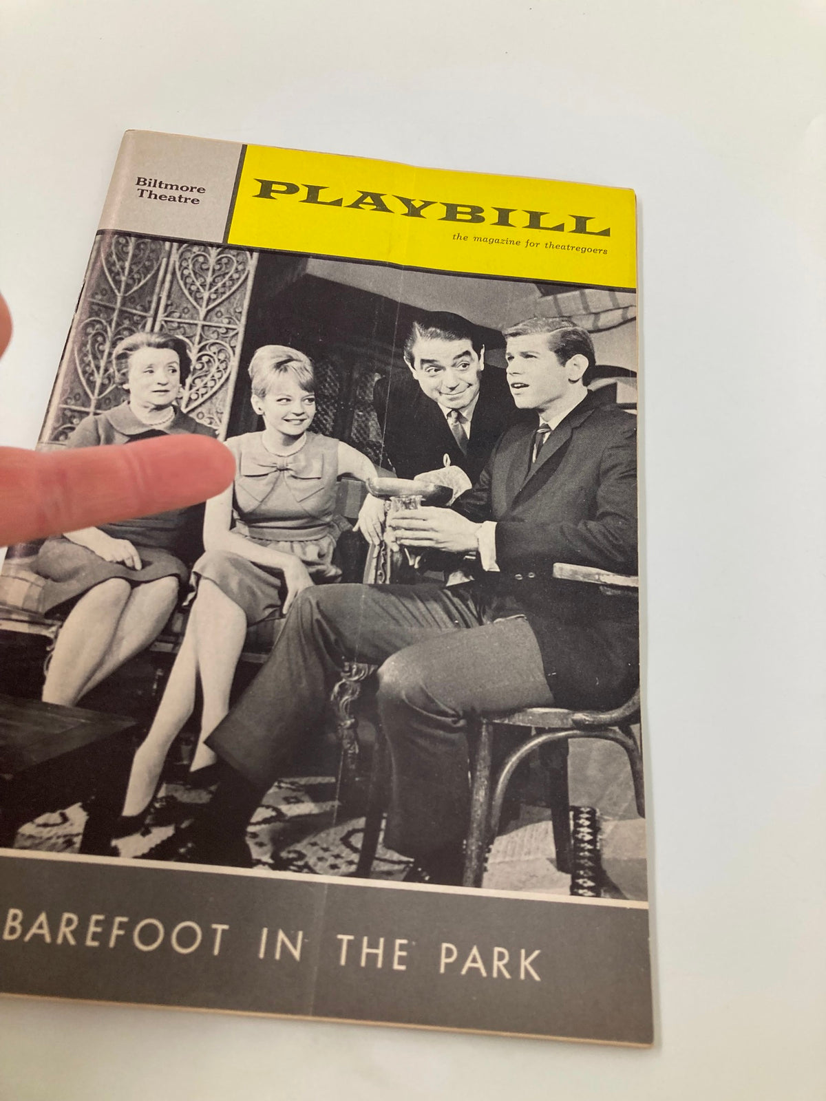 Close-up of the 1965 Playbill for Barefoot In The Park showcasing the cover design with cast members.