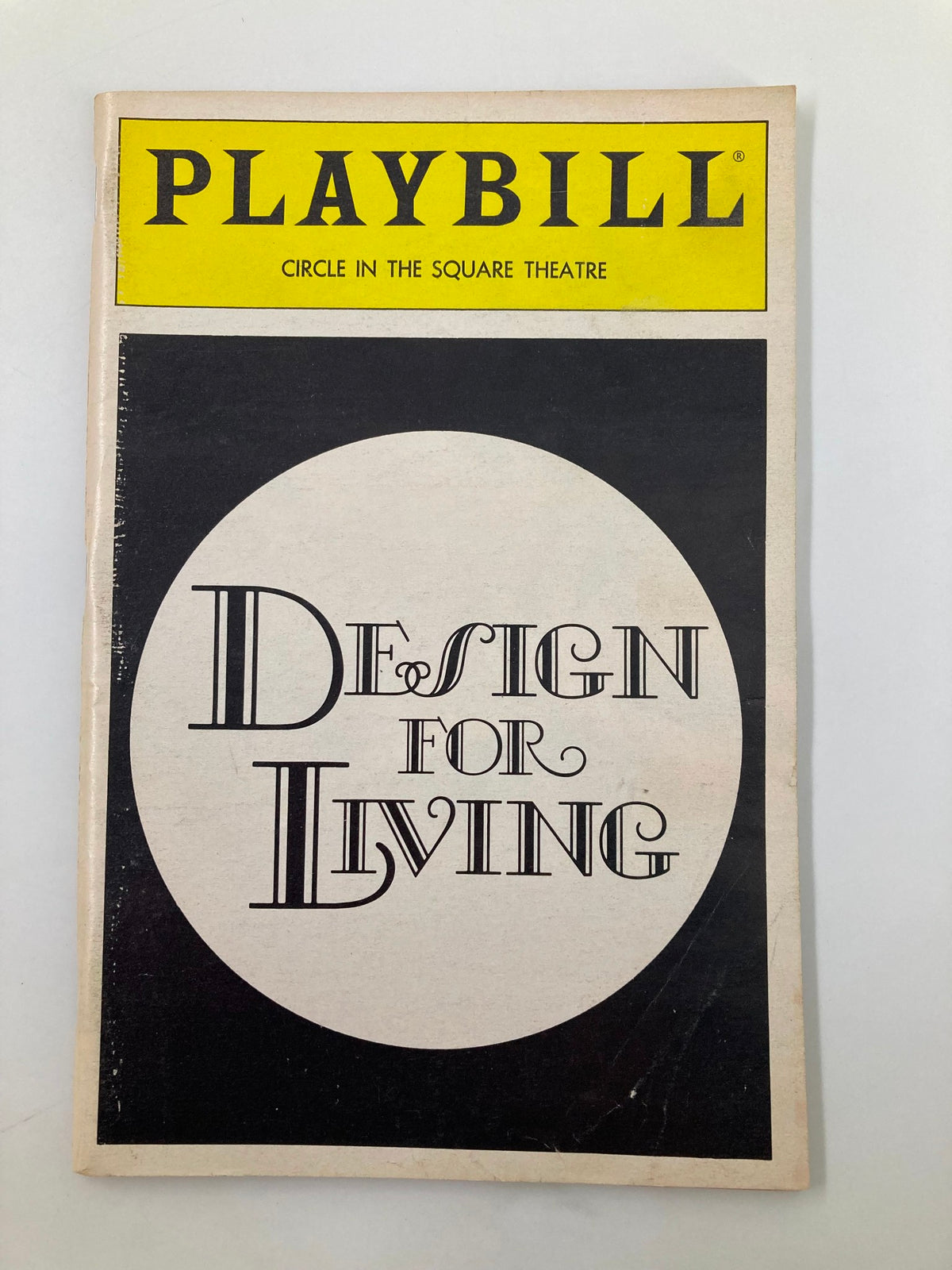 1984 Playbill for 'Design for Living' at Circle In The Square Theatre featuring a classic design and typography.