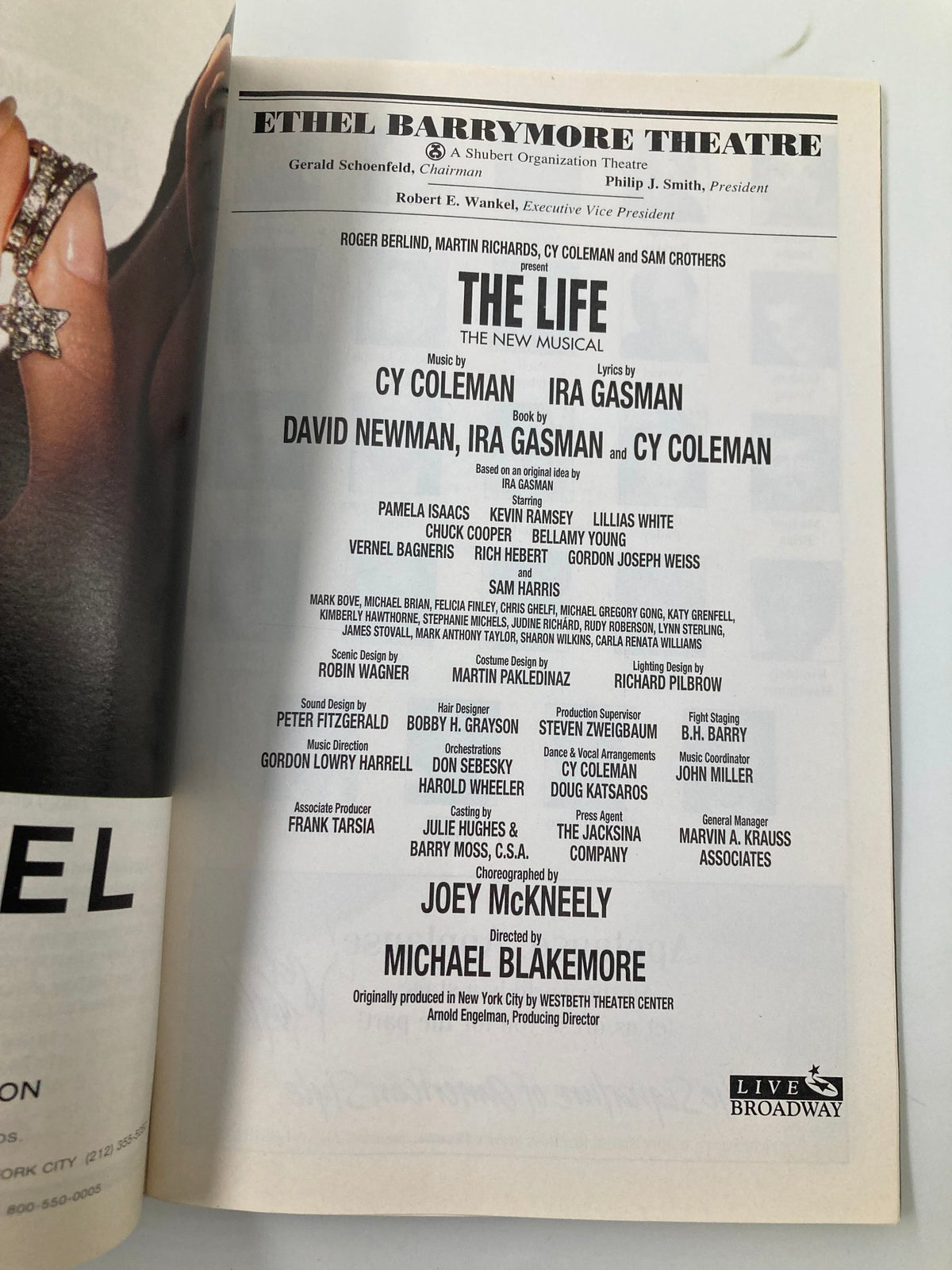1997 Playbill for The Life at Ethel Barrymore Theatre featuring the cast list and production credits.
