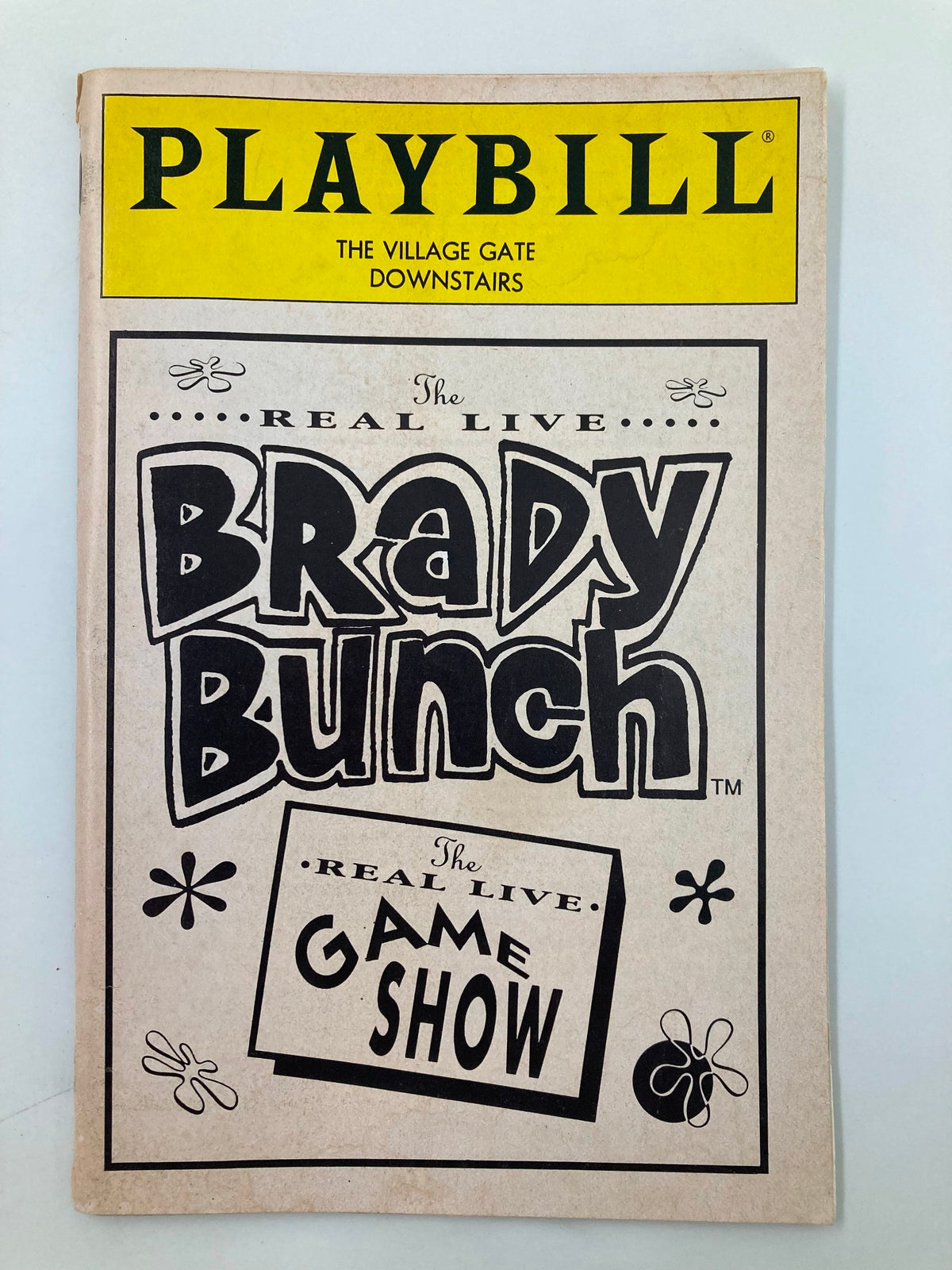 1992 Playbill The Village Gate Real Live TV Night featuring The Real Live Game Show cover design showcasing playful typography and floral graphics.