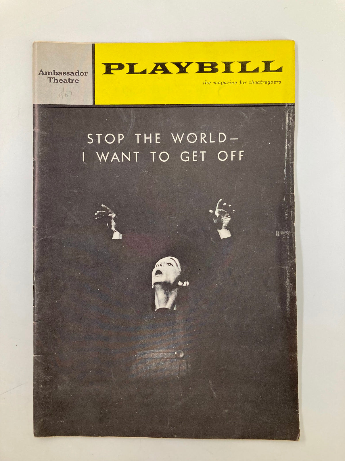 1963 Playbill for 'Stop The World – I Want To Get Off' at the Ambassador Theatre featuring a dramatic cover design.