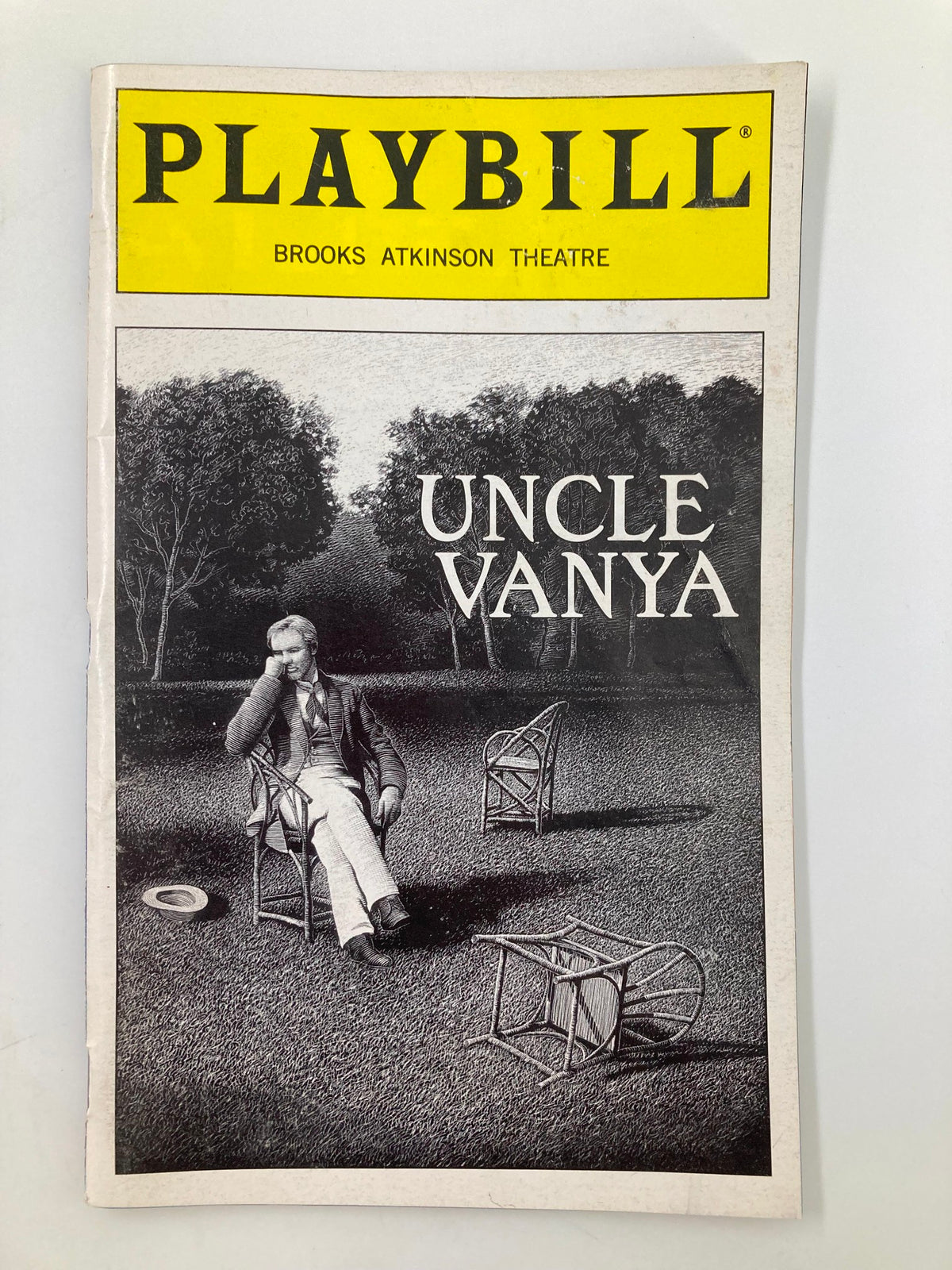 2000 Playbill for Uncle Vanya showcasing a black and white image of an actor seated in a garden scene, produced at the Brooks Atkinson Theatre featuring performances by Derek Jacobi and Laura Linney.