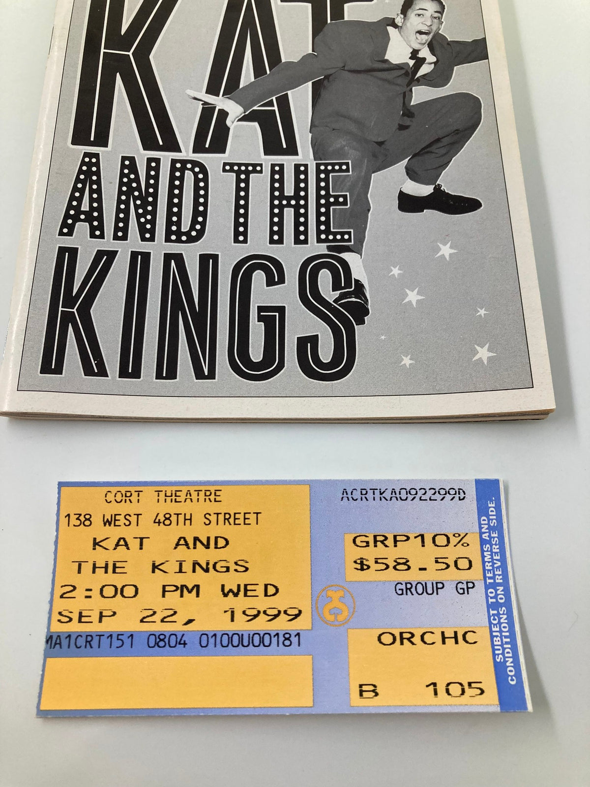 Close-up of the 1999 Playbill for Kat and The Kings at Cort Theatre, showcasing the ticket detail dated September 22, 1999.