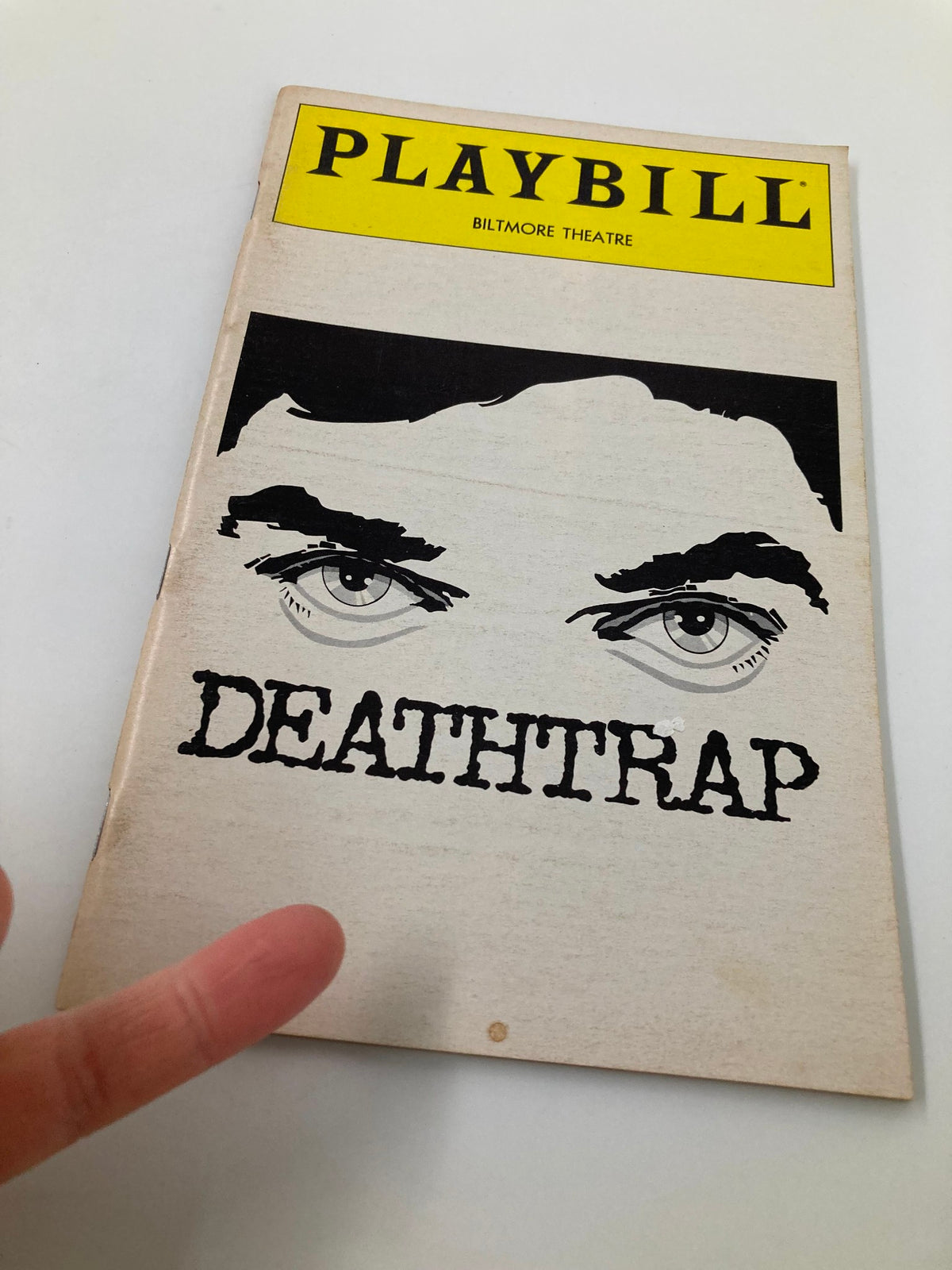 Front cover of the 1982 Playbill for the production of Deathtrap at Biltmore Theatre featuring iconic artwork and the title Deathtrap.