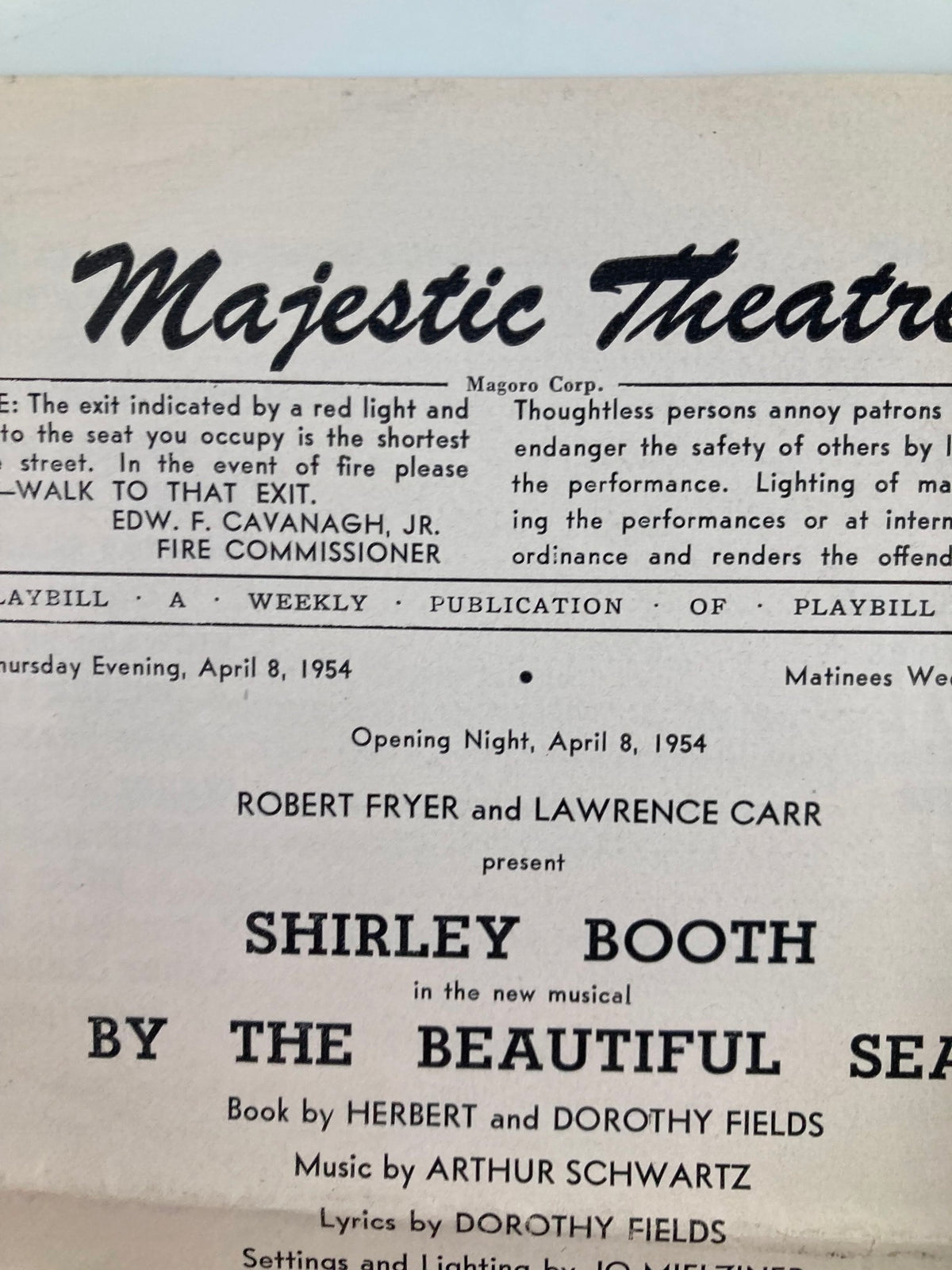 Detailed image of the 1954 Majestic Theatre By The Beautiful Sea playbill, illustrating the title and key production team including Shirley Booth and Wilbur Evans.