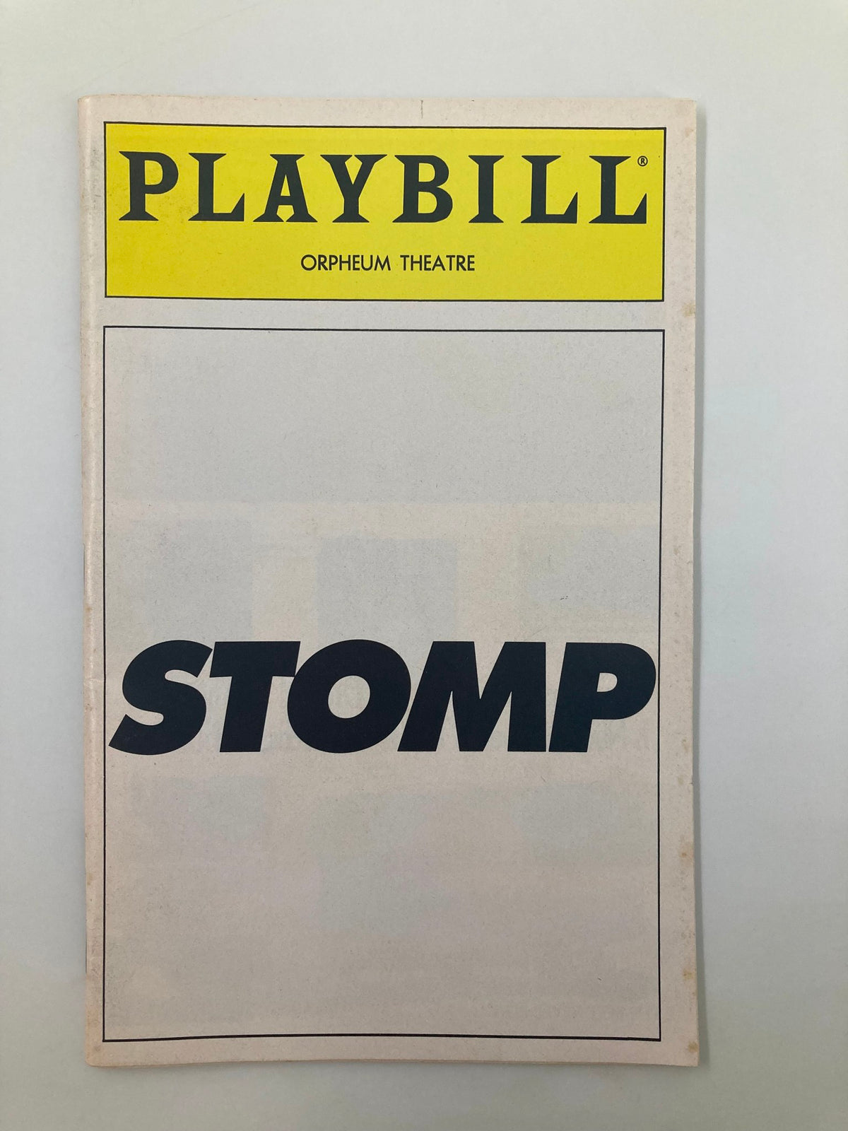Front cover of the 1995 Playbill for the Orpheum Theatre production of Stomp, featuring the title in bold letters.