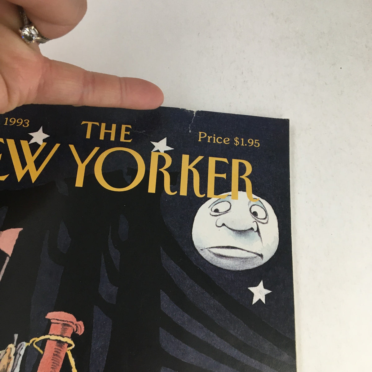 Close-up view of the top of The New Yorker magazine cover from September 27, 1993, highlighting details such as the price and a small crease.