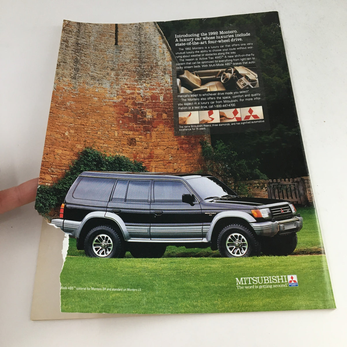 Advertisement page from The New Yorker, July 27, 1992, showcasing the 1992 Mitsubishi Montero luxury SUV in a scenic outdoor setting.