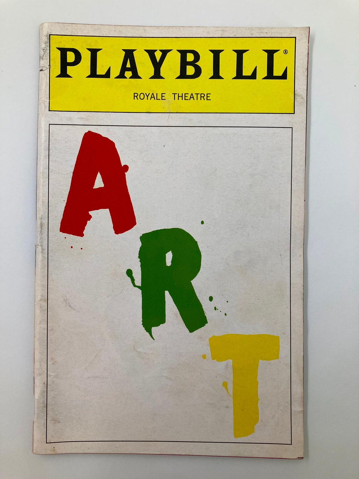 1998 Playbill titled 'ART' from Royale Theatre showcasing vibrant cover design with bold colors.