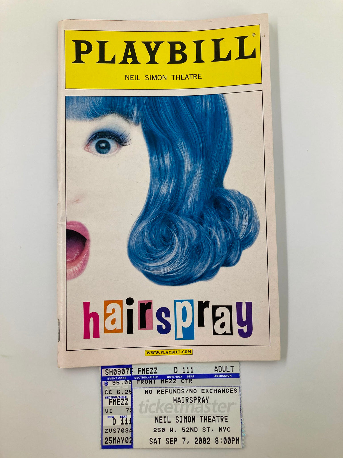 2002 Playbill for Hairspray at Neil Simon Theatre featuring vibrant cover art and original ticket from the performance on September 7, 2002.