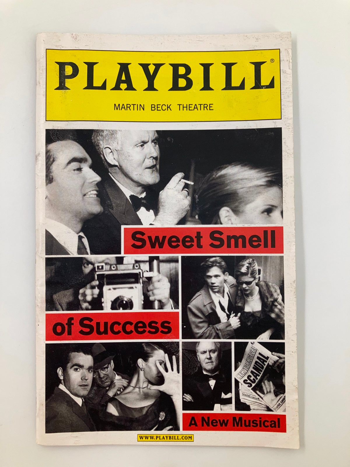 2002 Playbill from the Martin Beck Theatre for the musical 'Sweet Smell of Success' featuring prominent imagery related to the production.