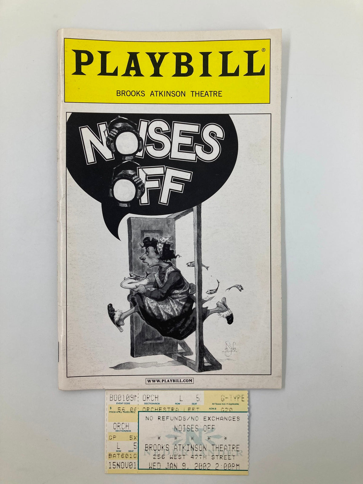 2002 Playbill for Noises Off at Brooks Atkinson Theatre with ticket included, showcasing comedic artwork and details of the performance.