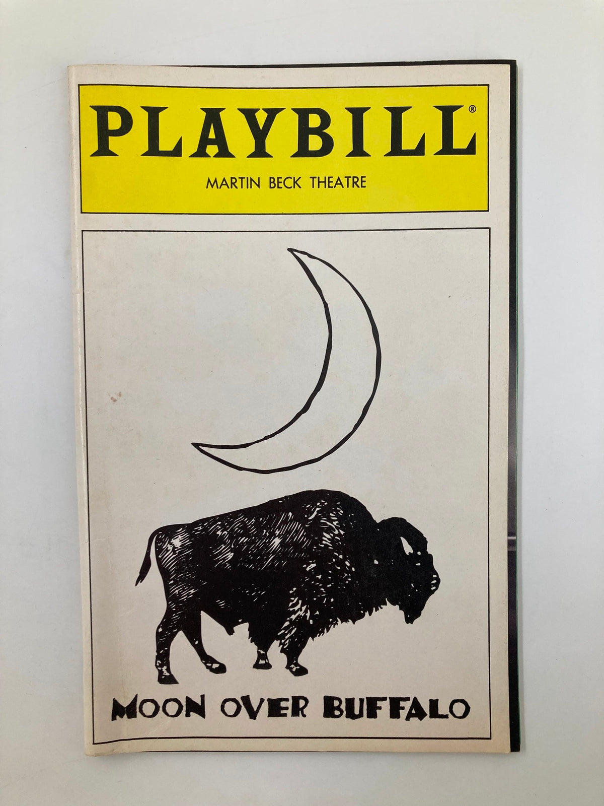1995 Playbill from Martin Beck Theatre featuring 'Moon Over Buffalo' with illustration of a buffalo and a crescent moon.