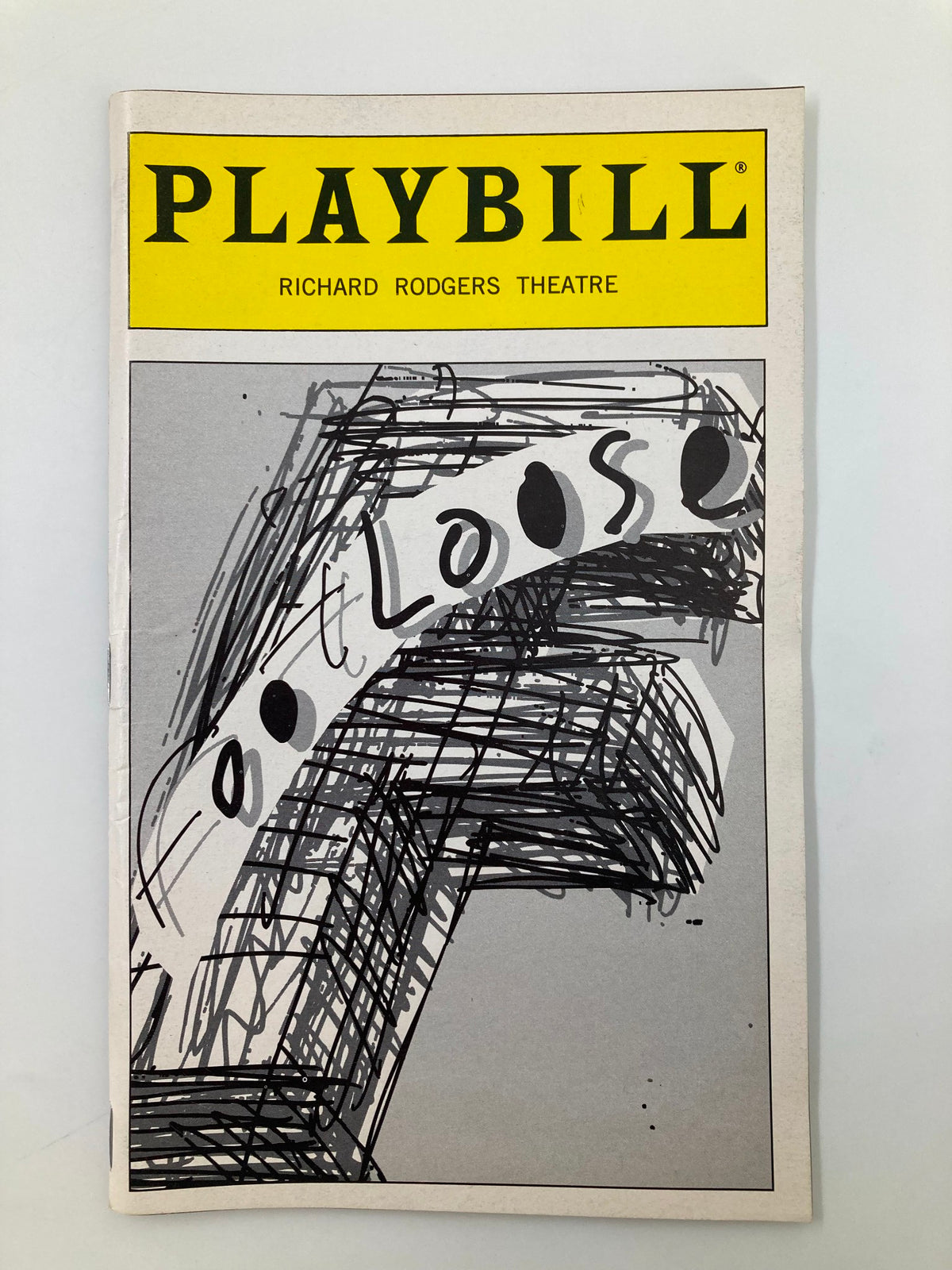 1999 Playbill from the Richard Rodgers Theatre featuring Footloose, showcasing artwork with the title 'Footloose' prominently displayed.