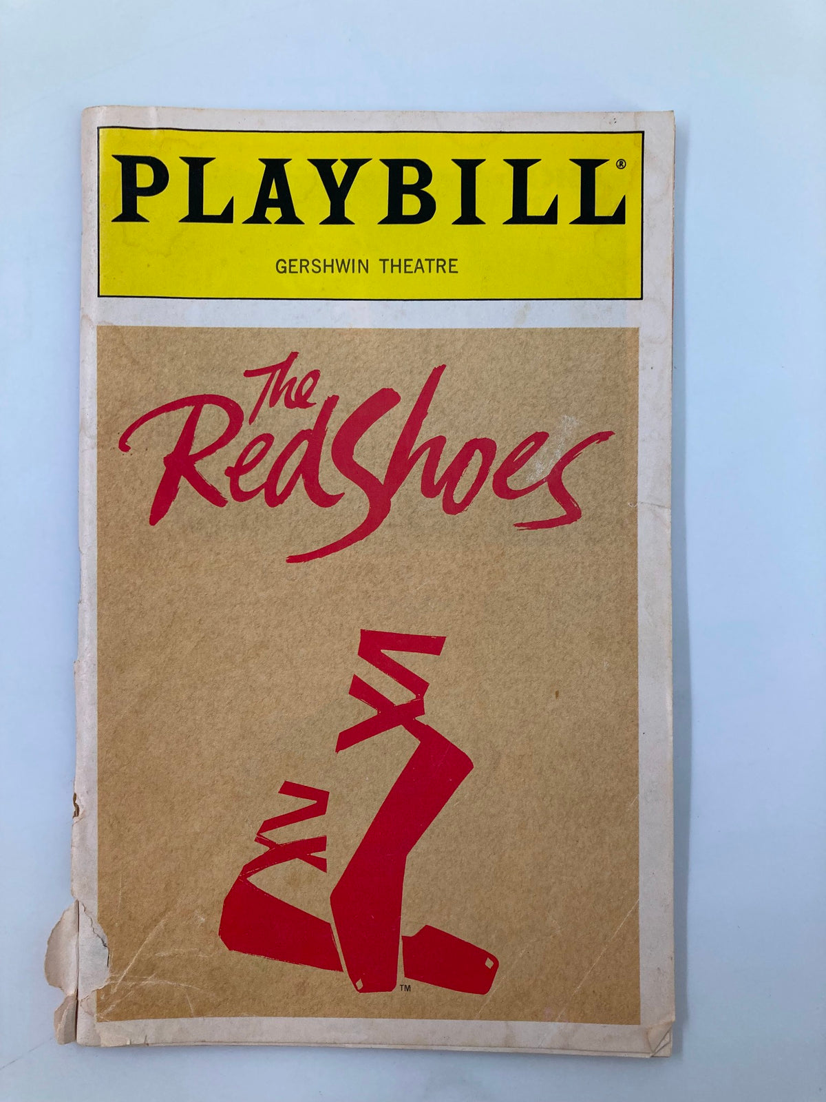 1993 Playbill for The Red Shoes at Gershwin Theatre featuring the iconic red shoe graphic, showing visible wear and creases.