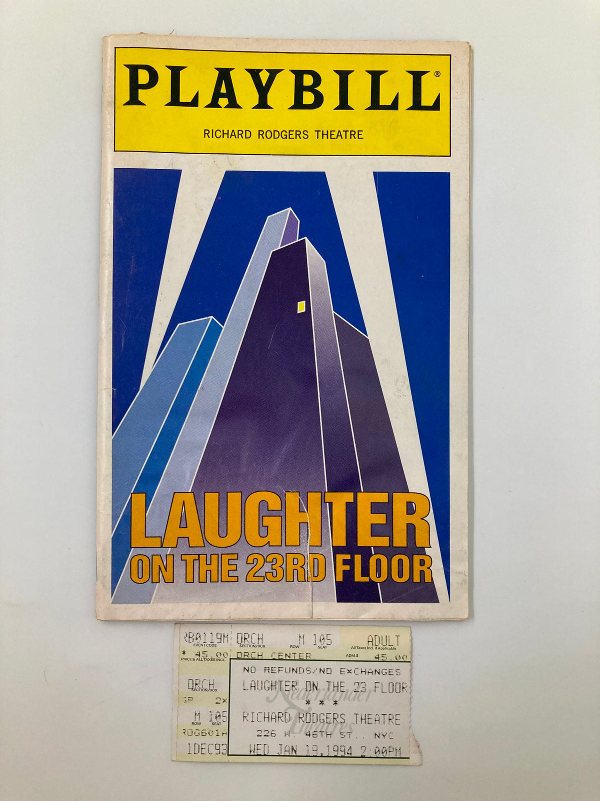 Vintage 1994 Playbill for 'Laughter On The 23rd Floor' from the Richard Rodgers Theatre, featuring a colorful cover design with skyscrapers.