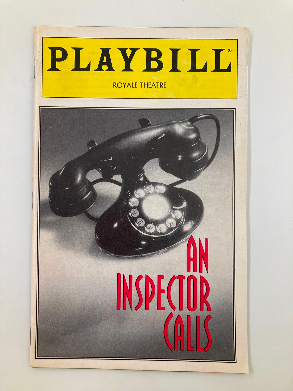 1994 Playbill for 'An Inspector Calls' at the Royale Theatre featuring a vintage telephone on the cover, showcasing classic theatrical design.