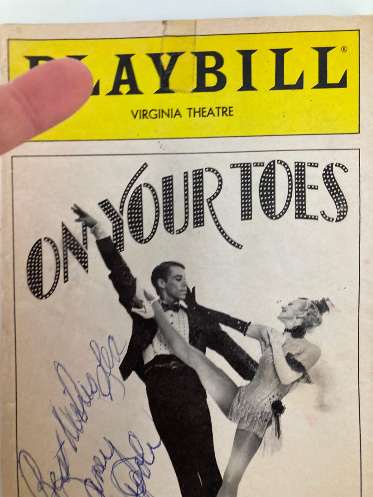 Detailed view of the 1984 Playbill Virginia Theatre On Your Toes showing performance details and signatures.