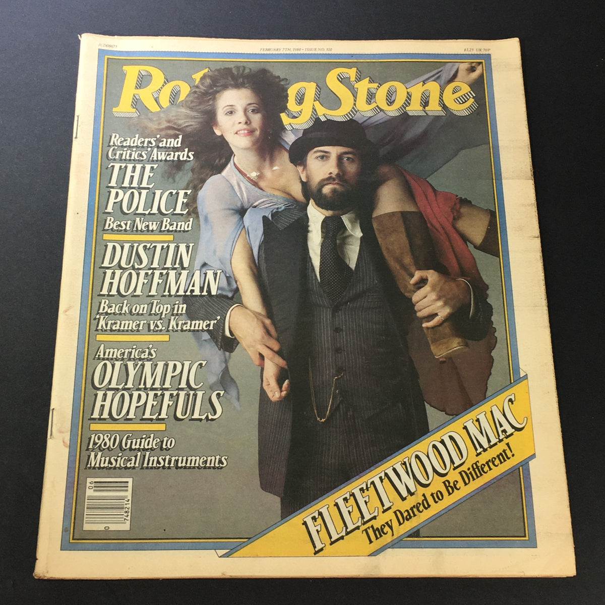 Cover of the vintage Rolling Stone Magazine from February 7, 1980, featuring Fleetwood Mac and Dustin Hoffman. Highlights include titles on The Police, awards, and a focus on musical instruments.