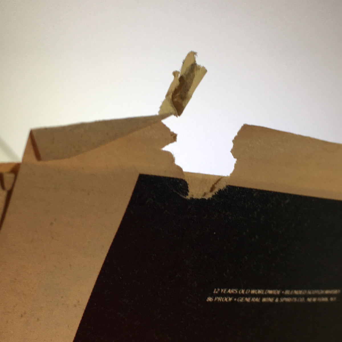Damage on the top edge of the VTG Rolling Stone Magazine December 4 1981 January 7 1982 showing minor wear typical for its age.