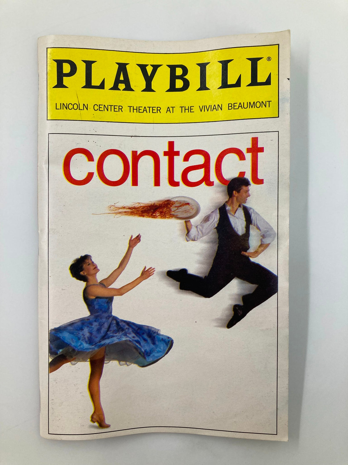 2000 Playbill Lincoln Center Theater featuring the show 'Contact' with a vibrant cover illustration showcasing dancers in dynamic poses.