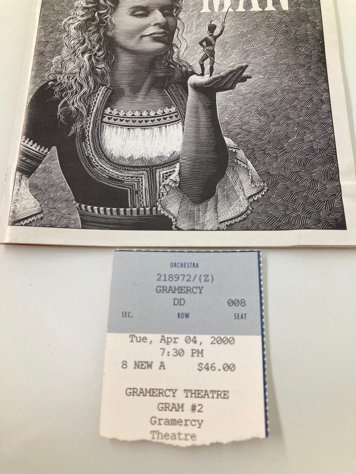 Close-up of the original ticket for 'Arms and the Man' at the Gramercy Theatre on April 4, 2000, showcasing details such as the date, time, and seat information.