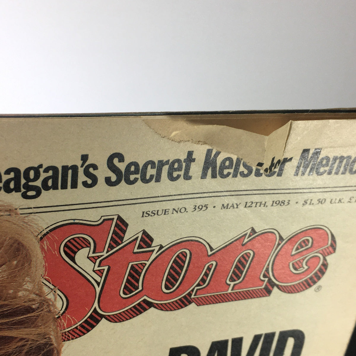 Top corner detail of VTG Rolling Stone Magazine May 12, 1986, showing 'Reagan's Secret Keister Memos' with minor wear indicating its vintage status.