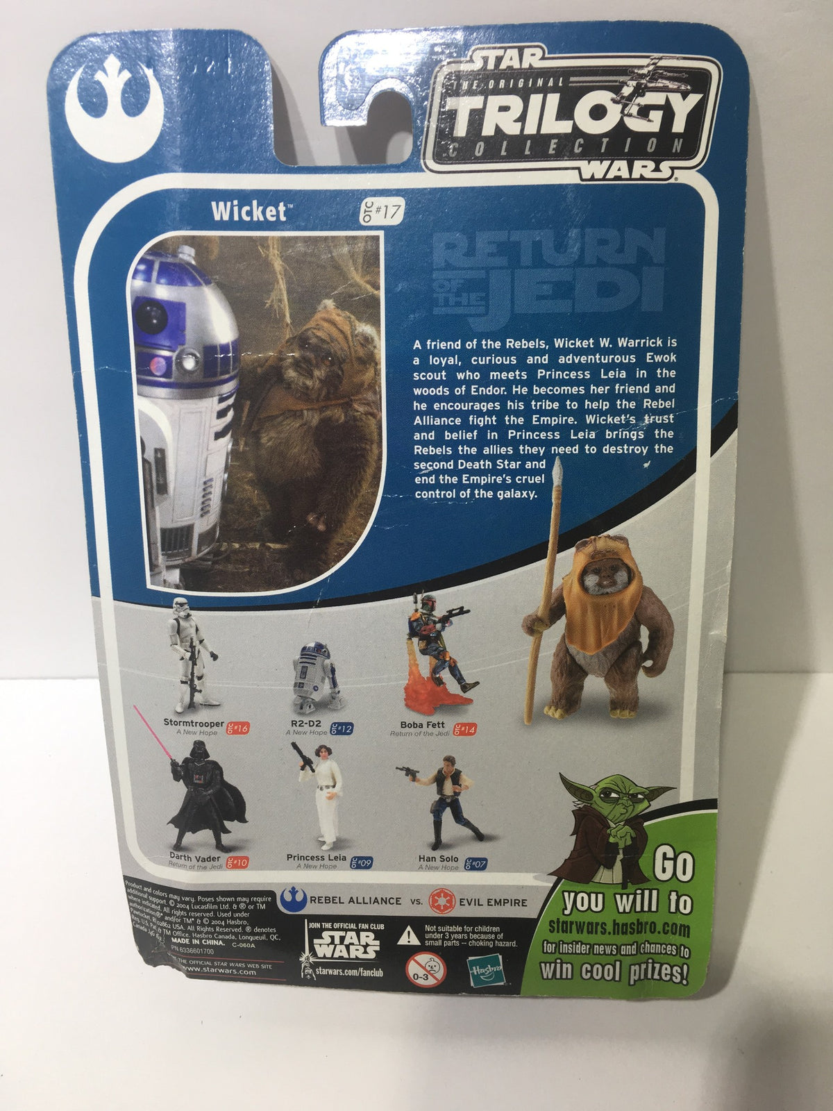 Back view of the Star Wars Original Trilogy Collection OTC Wicket #17 packaging, listing other characters and features, highlighting Wicket the Ewok.