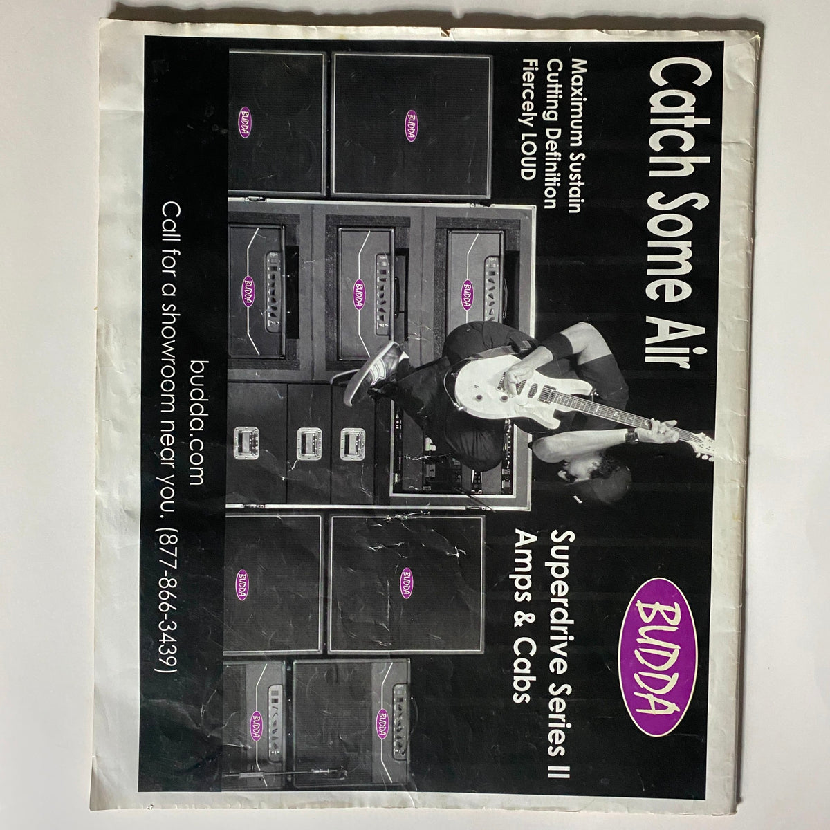 Advertisement in Zero Magazine April 2006 for Budda Amplifiers featuring a guitarist and showcasing their Superlative Series II amps and cabinets, promoting maximum sustain and high volume for musicians.