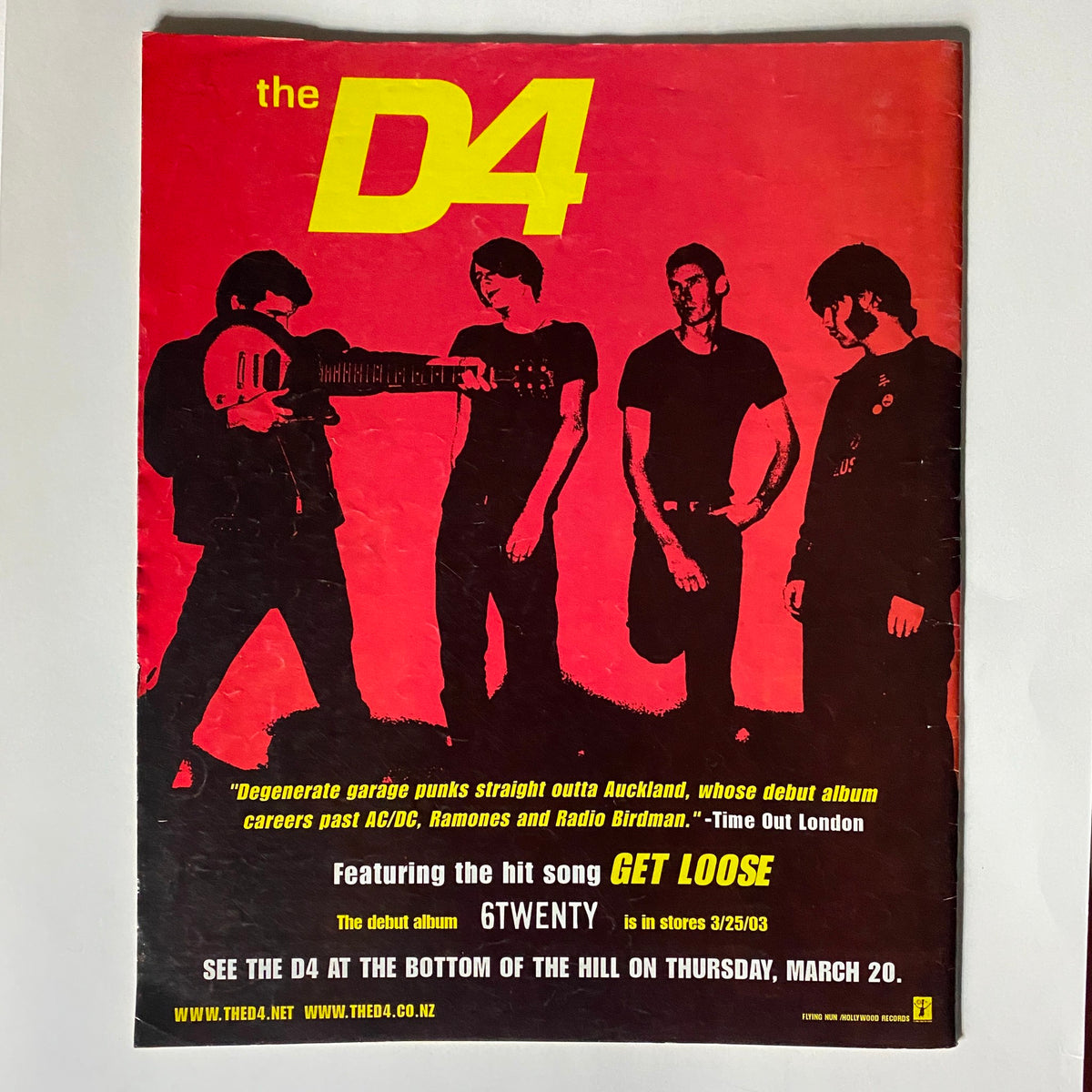 Cover of Zero Magazine March 10, 2003 featuring The D4, showcasing a dark silhouette of the band members and promotional details about their hit song 'Get Loose' and debut album '6Twenty'.
