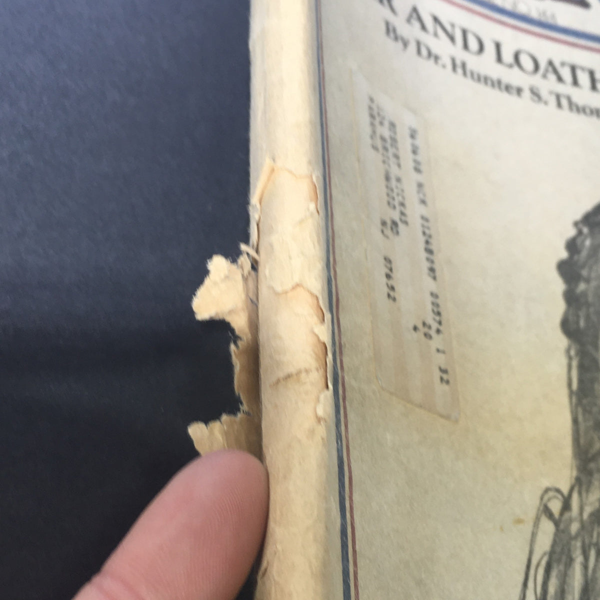 Close-up view of the edge of the September 27, 1973 Vintage Rolling Stone Magazine, highlighting the wear and tear typical of vintage publications.