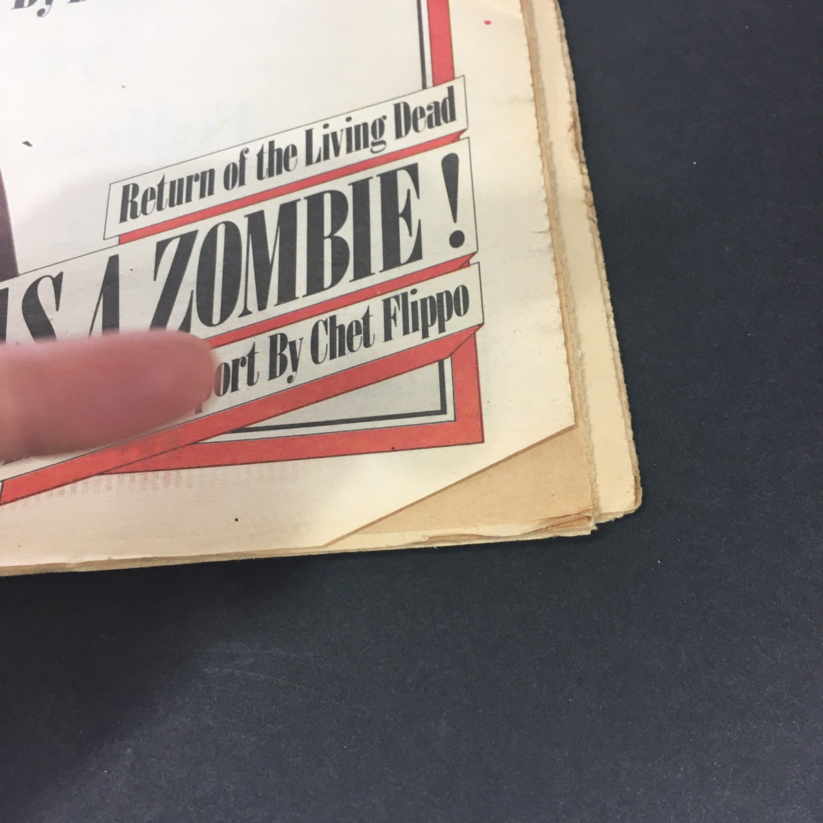 Detailed view of the corner of the VTG Rolling Stone Magazine March 23 1978 that shows wear and the article title 'I Was a Zombie!' for nostalgia.